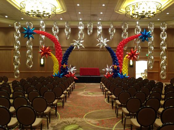 Large Curved Balloon Columns With Mylar Taper Topiary Toppers And Silver Mylar Chain Linked Balloons