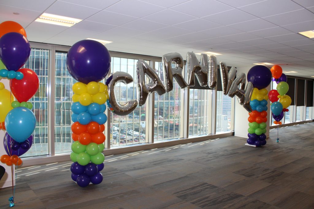 Balloon Columns With Mylar Letter Archway Super Size Bouquets Carnival Themed Event 1