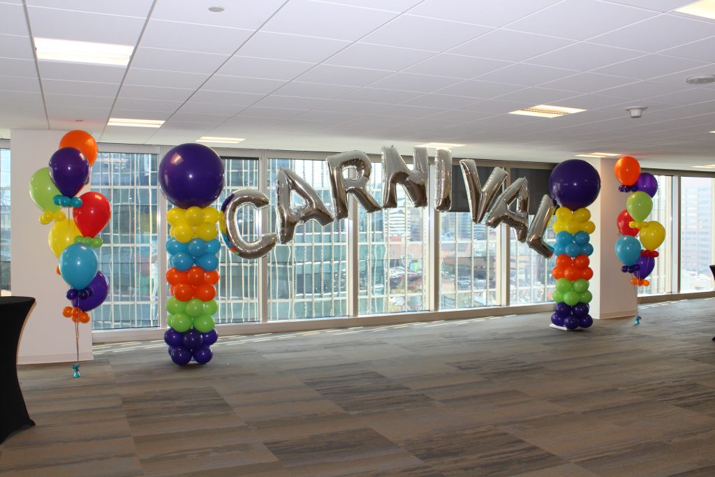 Balloon Columns With Mylar Letter Archway Super Size Bouquets Carnival Themed Event