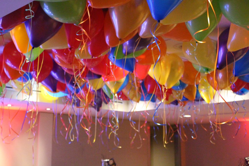 Ceiling Balloons With Streamers Over Dance Floor