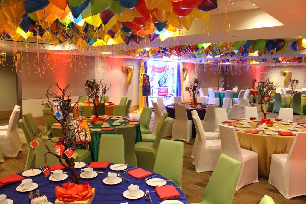 Colourful Table Linen Red Uplighting Ceiling Balloons 7th Birthday Celebration Westin Calgary