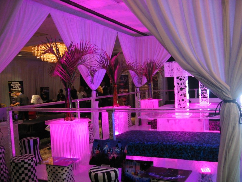 Pipe Drape With Pink Led Uplighting